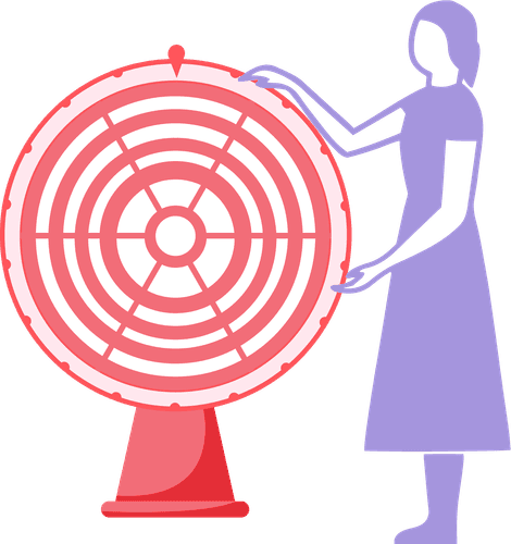 Woman standing next to a wheel of fortune 