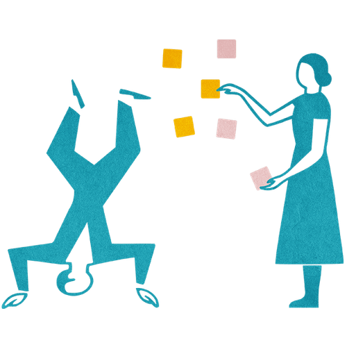 Eine Person macht einen Kopfstand, die andere klebt Post-its