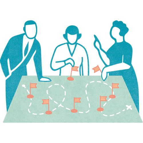 Drei Personen stehen um eine Landkarte und setzen Fähnchen darauf